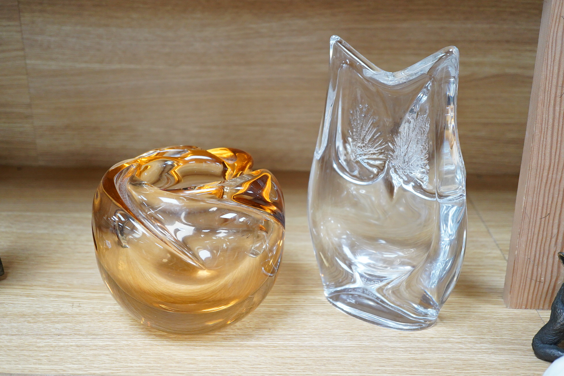 A Daum Nancy orange glass vase and a statue of an owl, largest 24cm high